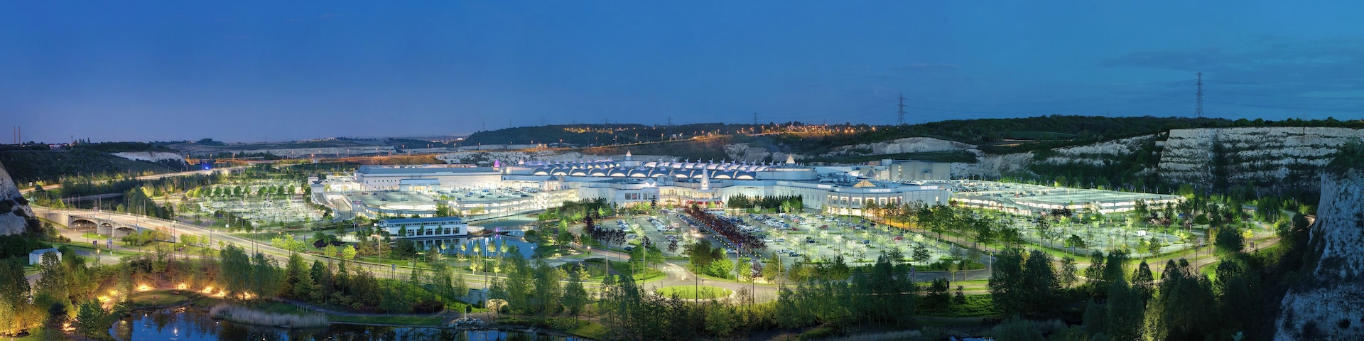 A 63 segment exposure fusioned image (3 exposure frames * 3 rows * 7 per row) of Bluewater Shopping Centre in Greenhithe, Kent, England. Taken by myself with a Canon 5D and 85mm f/1.8 lens.