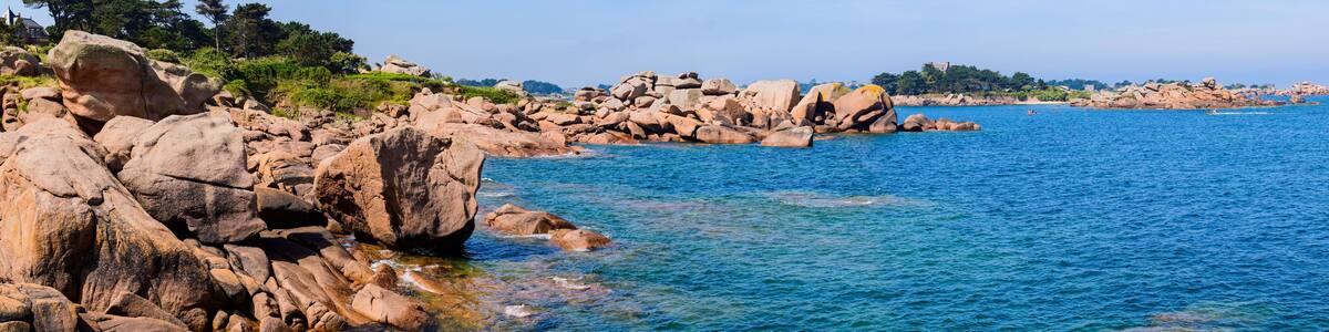 Sea Panoramic Landscape with huge pink granite boulders near Plumanach. The coast of pink granite is a unique place in Brittany. France