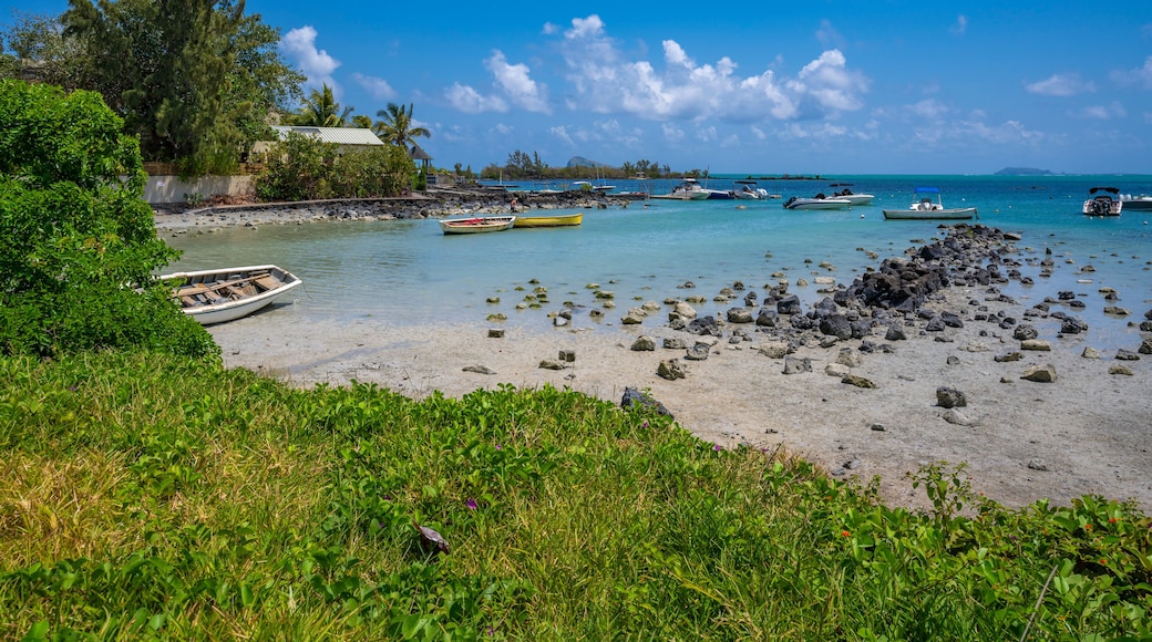 View of beach and turquoise Indian Ocean on sunny day near Poste Lafayette, Mauritius