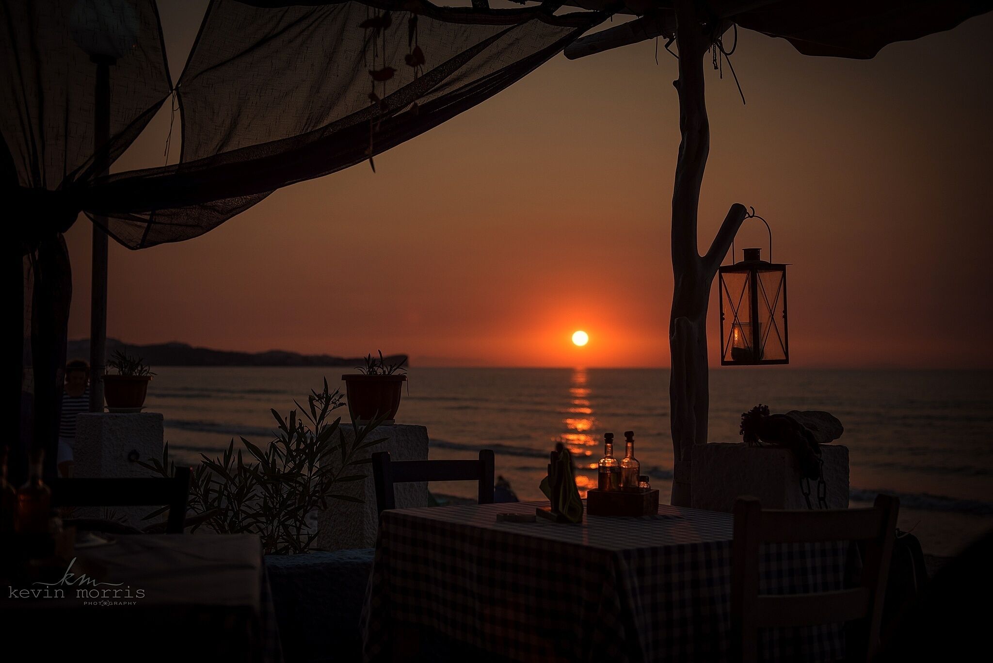 Sunset at Afros Tavern in the seaside town of Acharavi, Corfu. Sat here sipping wine watching the sun disappear - heaven