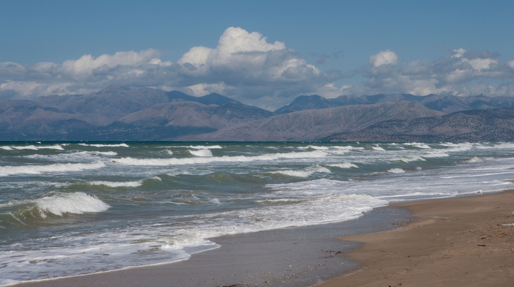 Beach at Acharavi Island of Corfu Greece. Waves at the coast. Mediterranean sea