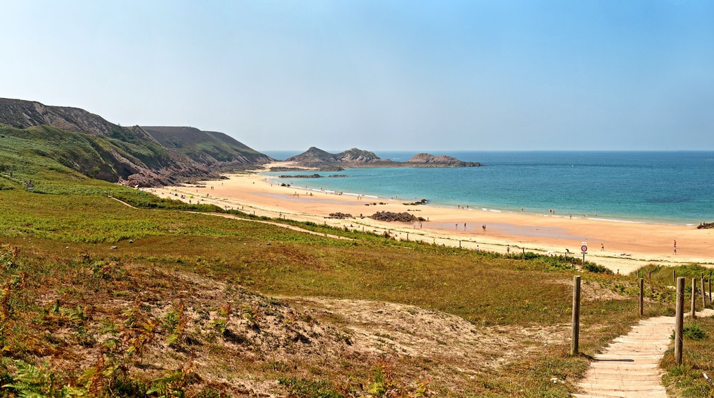 Rough rocky coastal panoramic landscape of Brittany with blue sk