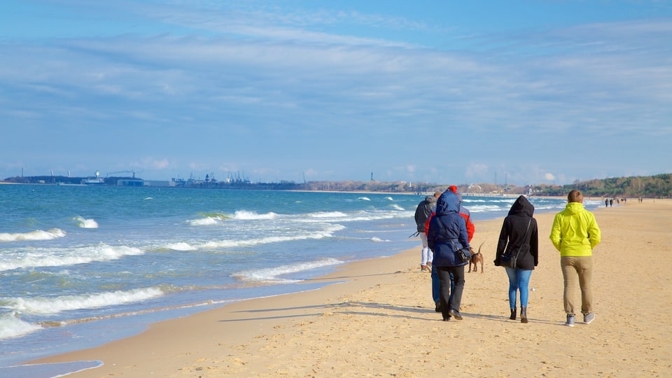 Jelitkowo Beach showing a beach as well as a small group of people