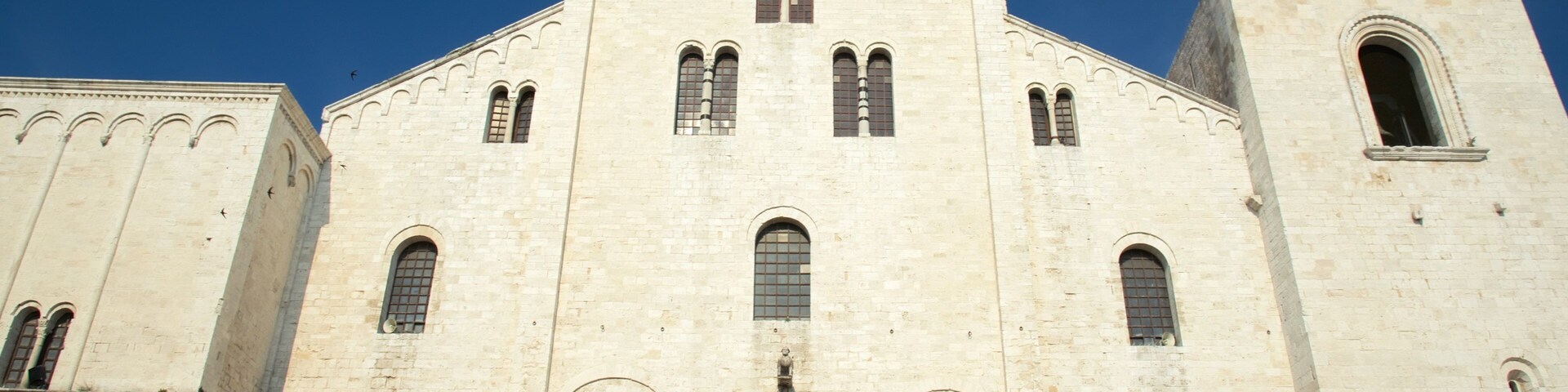 Basilica of San Nicola which includes heritage architecture, a church or cathedral and religious aspects
