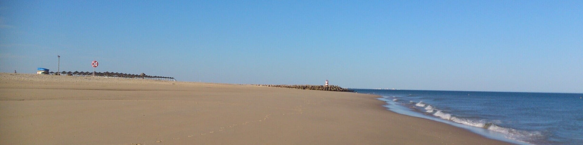 Ilha de Tavira is one of six barrier islands that makes up 18400 hectares of protected nature reserve along the Ria Formosa along with wetlands, mudflats and hundreds of species of plant and wildlife.
The island itself has a commercialised centre with wooden walkways and cafes, bar, restaurants as well as a camping area (no hotels on the island). I felt a bit like i'd arrived at a theme park but once you go thought this and on to the beach, its lovely. A blue flag beach, 11km of coastline, sun shades and sun beds to rent but plenty of sand to spread out a towel away from the hustle and bustle.
The island beach is only accessible by boat and there is a water taxi and ferry service that operates daily. During the summer tourist months the ferry runs from Tavira centre from the quay side near the indoor market. But in the offpeak months (even in May) you have to go to the Quatro Águas pier. (Don't be fooled by the ferry moored on the quay looking like it is waiting for passengers!)
The walk to the ferry felt long, it was probably 20 minutes of so but in the baking sun along deserted road and salt fields it felt a trek. I'd recommend getting the bus if you can work out the timetables.
Ferry Times: http://tavira.algarvetouristguide.com/beaches/tavira-island
#NationalPark #Beach