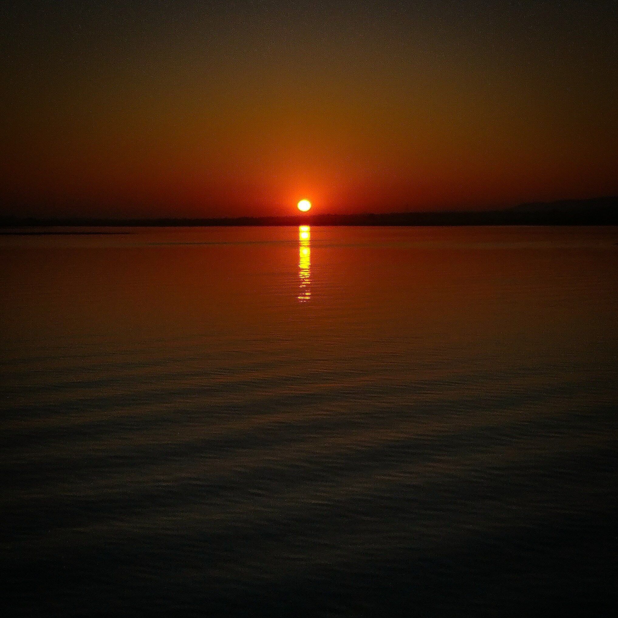 Sunset over Ria Formosa taken from the ferry to Olhäo, Algarve, Portugal