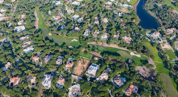 Exclusive Luxury Real Estate at San Lorenzo Golf Course: 4K Aerial View of Palatial Mansions, Private Infinity Pools, and Championship Fairways in Quinta do Lago, Algarve, Portugal