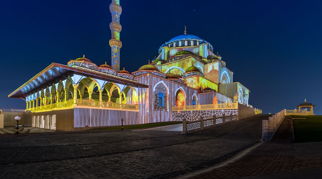 Beautiful shot of the illuminated Al Noor mosque in Sharjah, United Arab Emirates