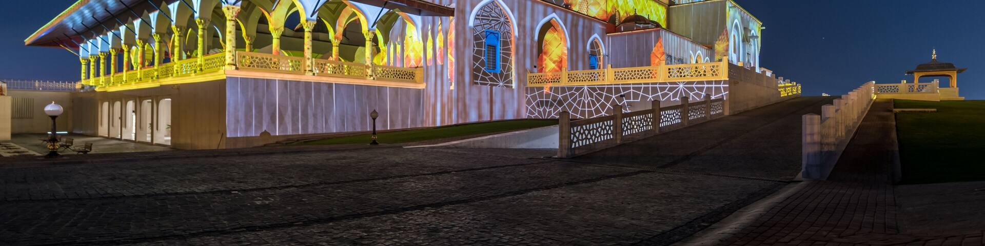 Beautiful shot of the illuminated Al Noor mosque in Sharjah, United Arab Emirates