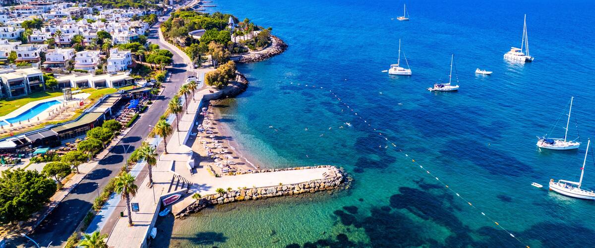 Aerial view of Turgutreis, Bodrum. Mugla, Turkey. Panoramic view of Turgutreis marina and beach. Drone shot.