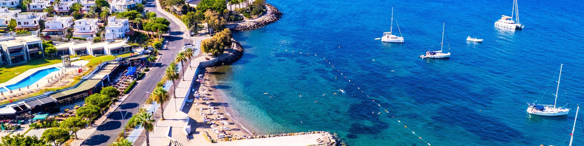 Aerial view of Turgutreis, Bodrum. Mugla, Turkey. Panoramic view of Turgutreis marina and beach. Drone shot.