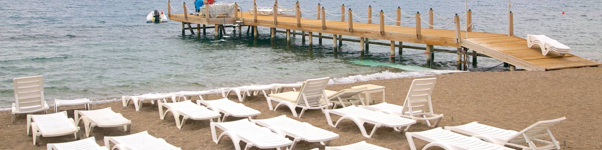 Yalikavak Beach showing general coastal views and a pebble beach