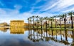 Beautiful Jnan Sbil or Bou Jeloud garden, Royal Park in Fez with lake and palms. Location: Fez, Morocco, Africa. Artistic picture. Beauty world