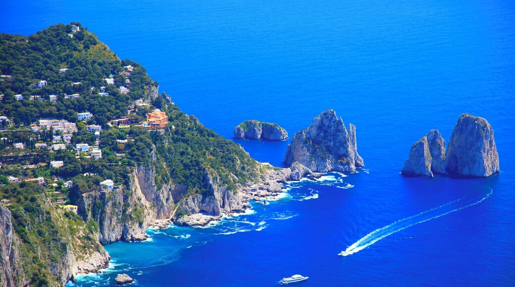 Capri island panorama from Monte Solaro, Faraglioni and Tyrrhenian sea, Bay of Naples, Italy.