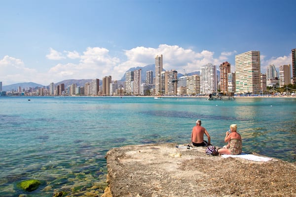 Levante Beach featuring general coastal views and a coastal town as well as a couple