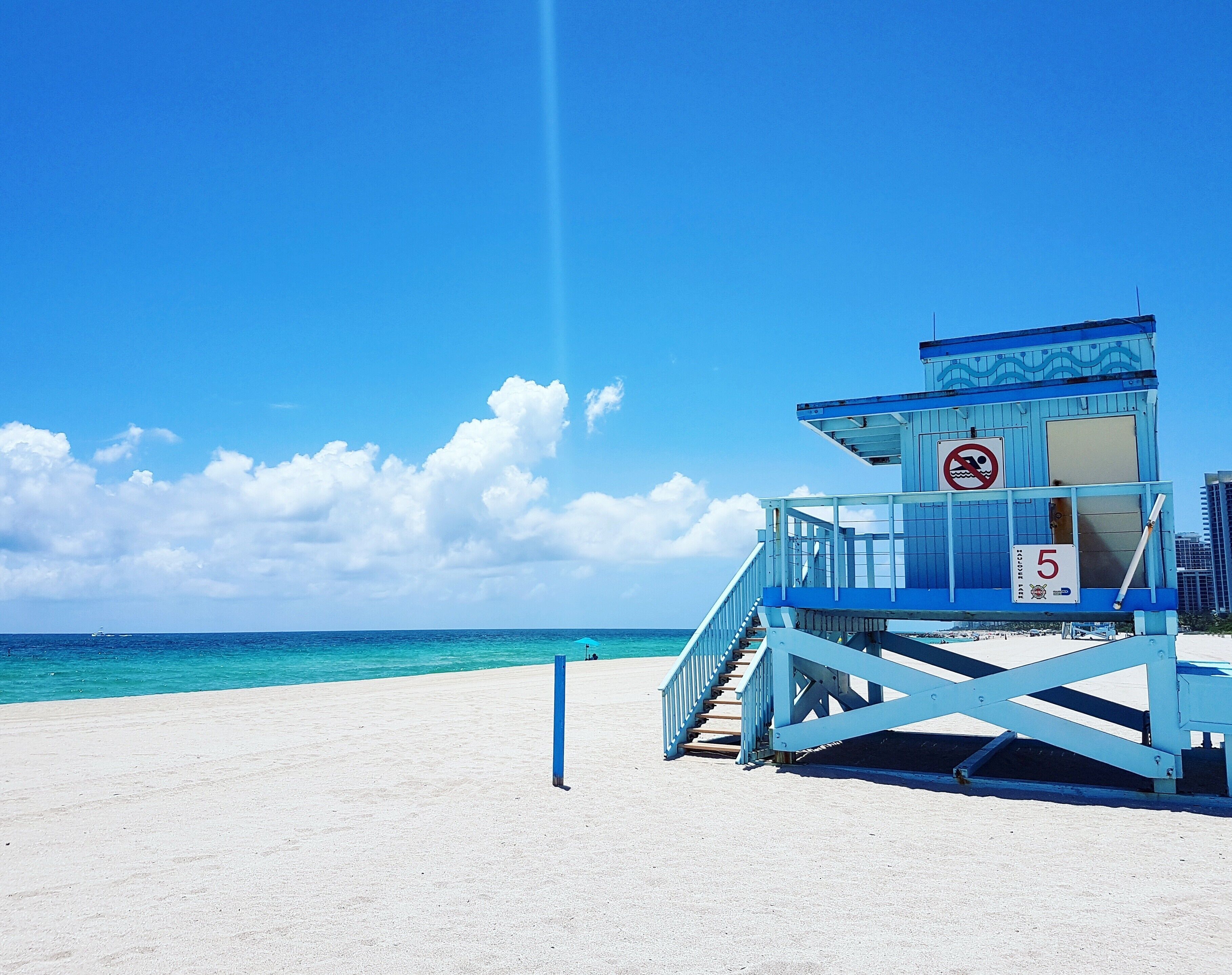 Haulover Beach Park is one of the quietest beaches in Miami. Near the pier are the blue life guard houses. Climb up one of the vacant ones and take soak in the view. #BVSBlue