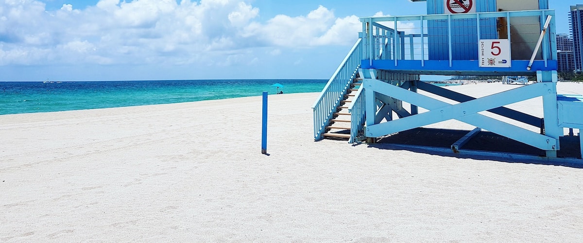 Haulover Beach Park is one of the quietest beaches in Miami. Near the pier are the blue life guard houses. Climb up one of the vacant ones and take soak in the view. #BVSBlue