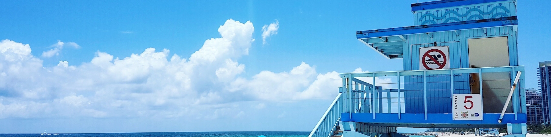 Haulover Beach Park is one of the quietest beaches in Miami. Near the pier are the blue life guard houses. Climb up one of the vacant ones and take soak in the view. #BVSBlue