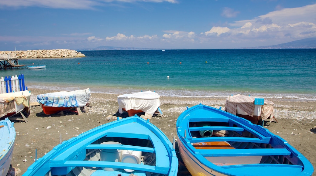 Marina di Puolo showing boating and a pebble beach