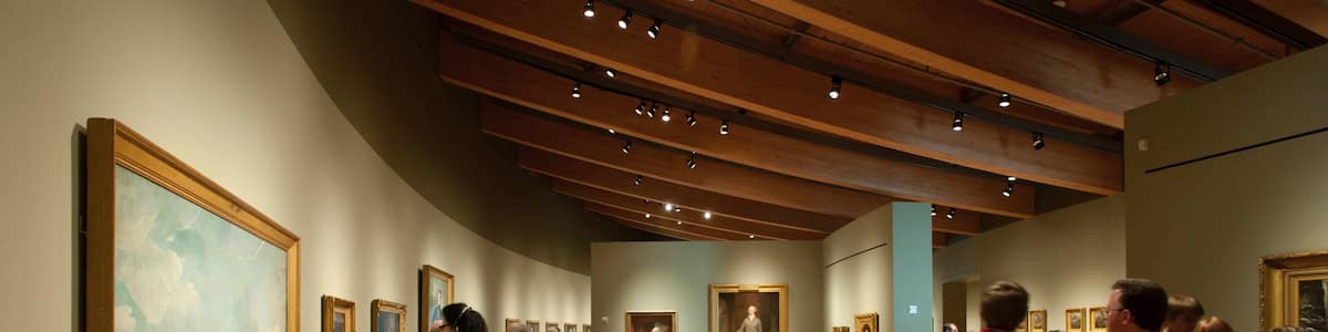 Crystal Bridges Museum of American Art which includes art and interior views as well as a small group of people