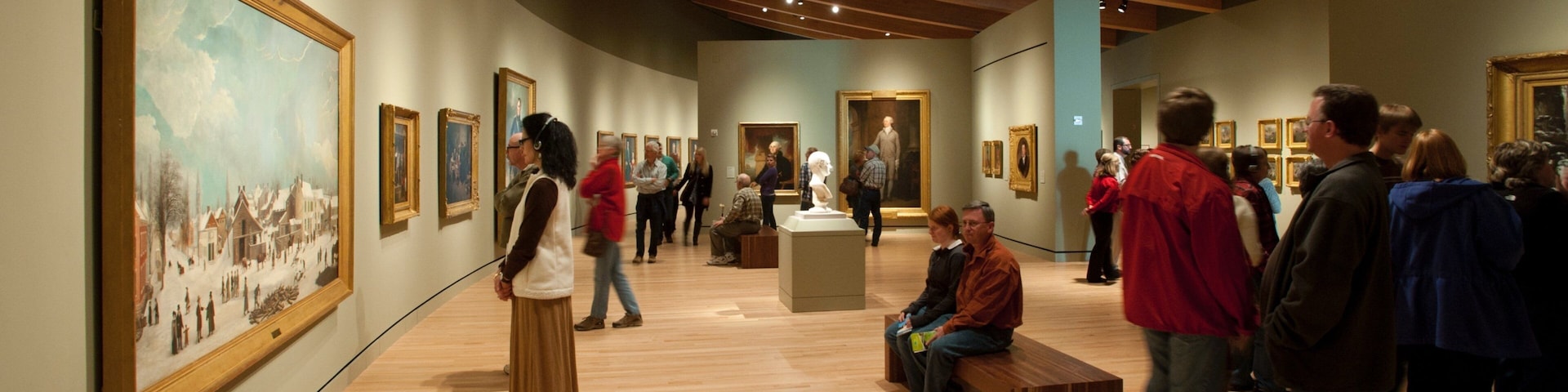 Crystal Bridges Museum of American Art which includes art and interior views as well as a small group of people