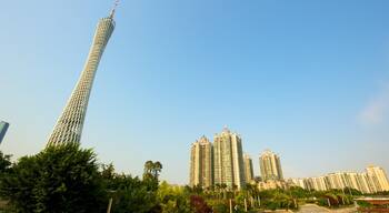 Canton Tower which includes a high-rise building, modern architecture and central business district