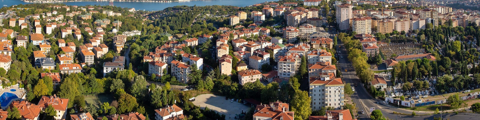 High angle aerial panoramic view of houses in Etiler region of Besiktas district and Bosphorus on the background, Istanbul, Turkey on September 5, 2020.