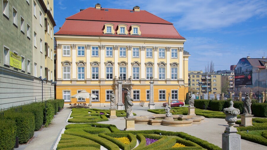 Wroclaw Palace featuring a castle, heritage elements and a park