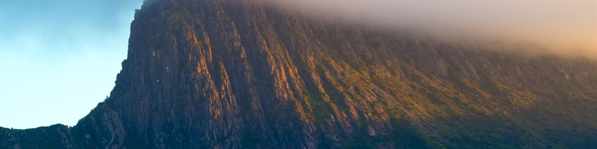 Midlands which includes mountains, mist or fog and a sunset