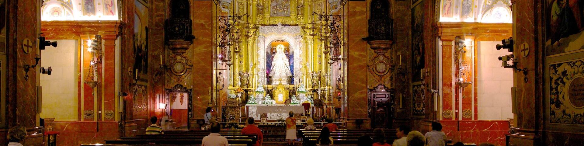 Basilica of the Macarena showing a church or cathedral, religious elements and interior views