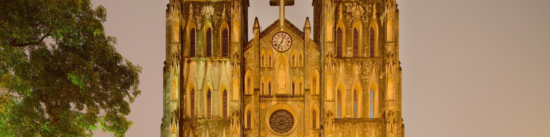 St. Joseph Cathedral featuring heritage architecture, markets and a church or cathedral