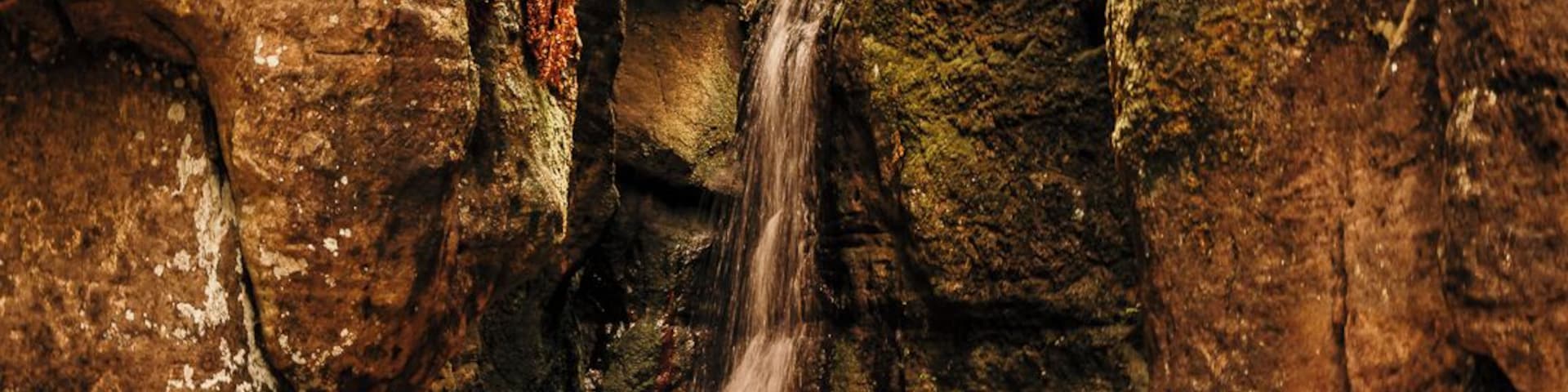 This small waterfall is a beautiful spot within the Adrspach Rock City. The temperature within the rock city is much colder as the sun rarely penetrates beyond the tops to warm it enough.
Take the time to go out, leave your mobile phone in the car and go for a walk through woodland with nature being the only connection. Be present in the moment without the every day disruptions. Indulge your creativity.
My go to pick me up is a walk in the woods. For many people the most brief time spent outdoors is time well spent for their mental well being. I take the time to listen to the birds, the trees creaking, watch the sunshine filtering through the leaves of the trees, smell the tree bark, hear leaves crumple under-foot. I will always come back from the woods with fresh ideas and lifted spirits.
#czech #visitczech #instone #traveltheworld #getoutgirl #waterfall #rocks #mountains #europe #hiking #climbing #exquisitewaterfalls #nature #landscape #remote #travel #europe #nature