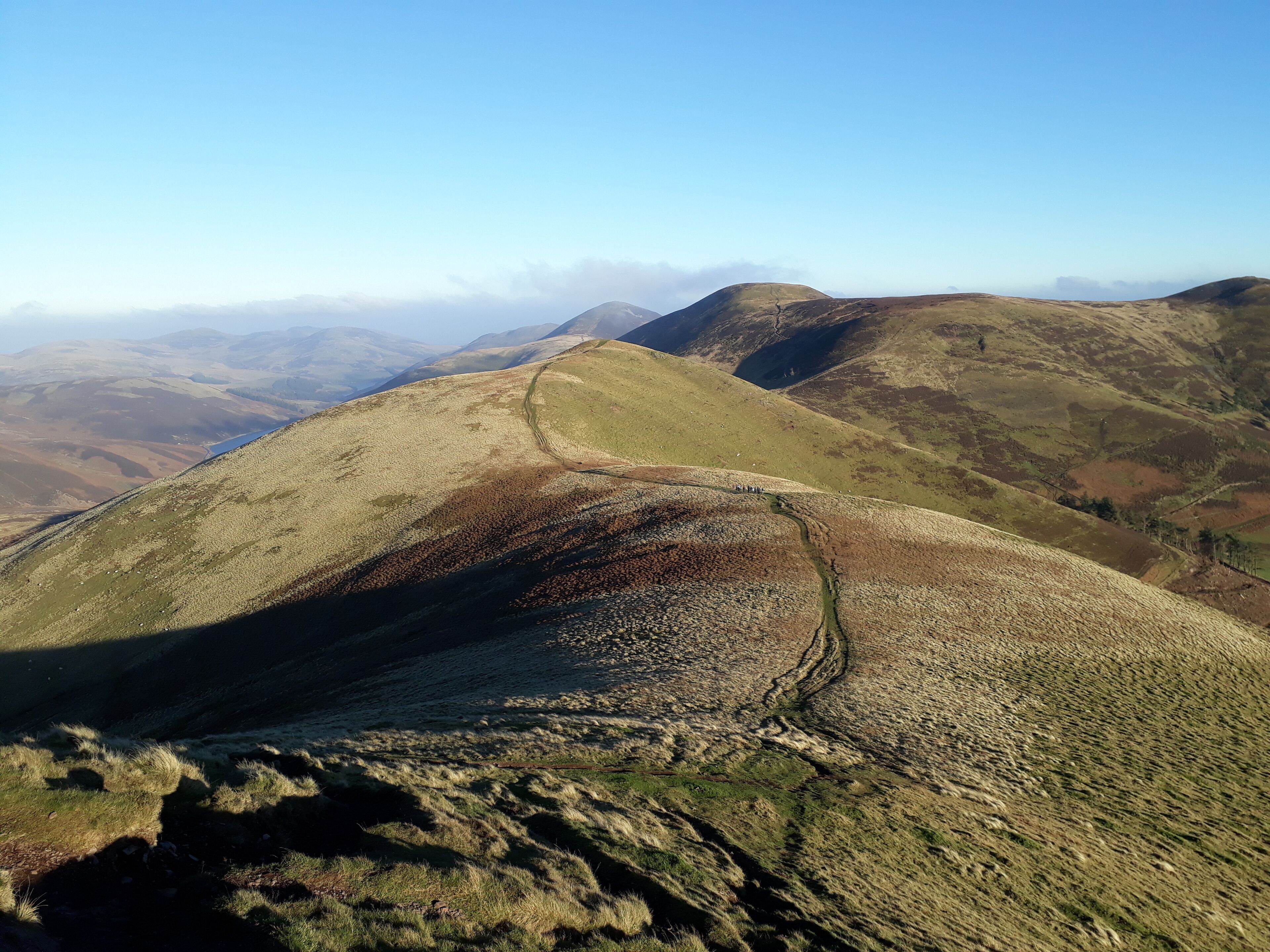 Descending West Kip in bright low sun