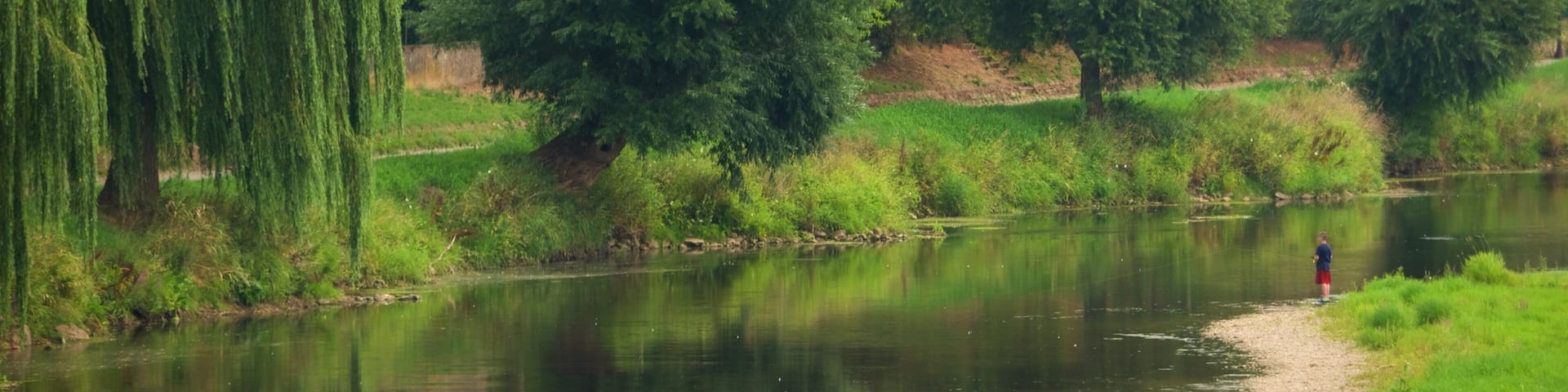Diekirch which includes a river or creek and a small town or village