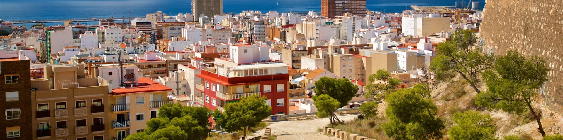 San Fernando Castle showing a coastal town and landscape views