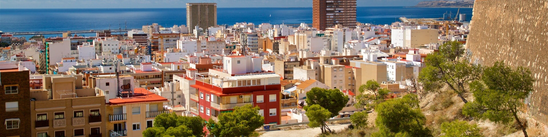 San Fernando Castle showing a coastal town and landscape views