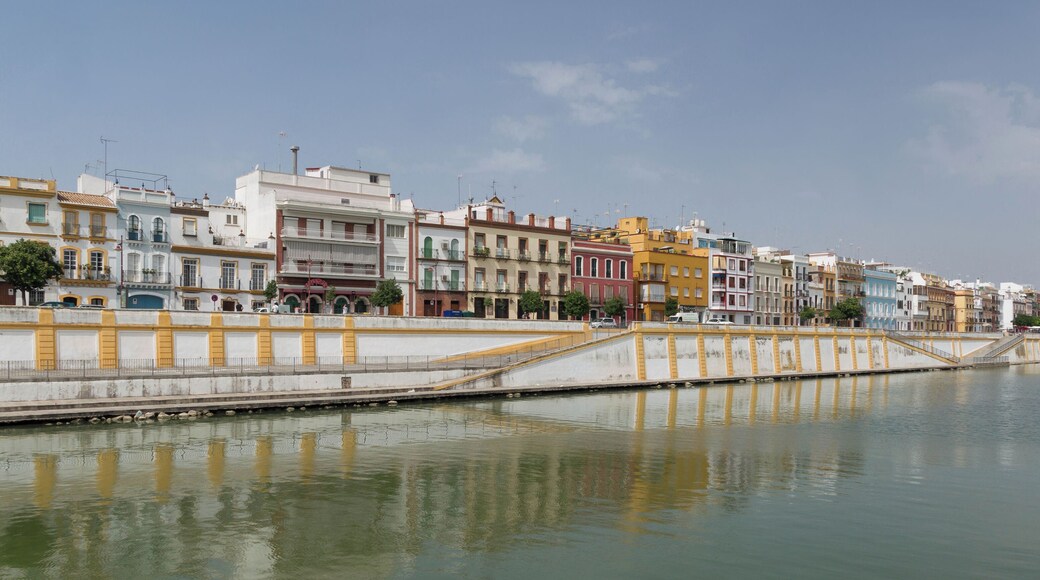 The embankment of the Triana neighborhood, as seen from a boat on the Guadalquivir river, Seville, Spain.