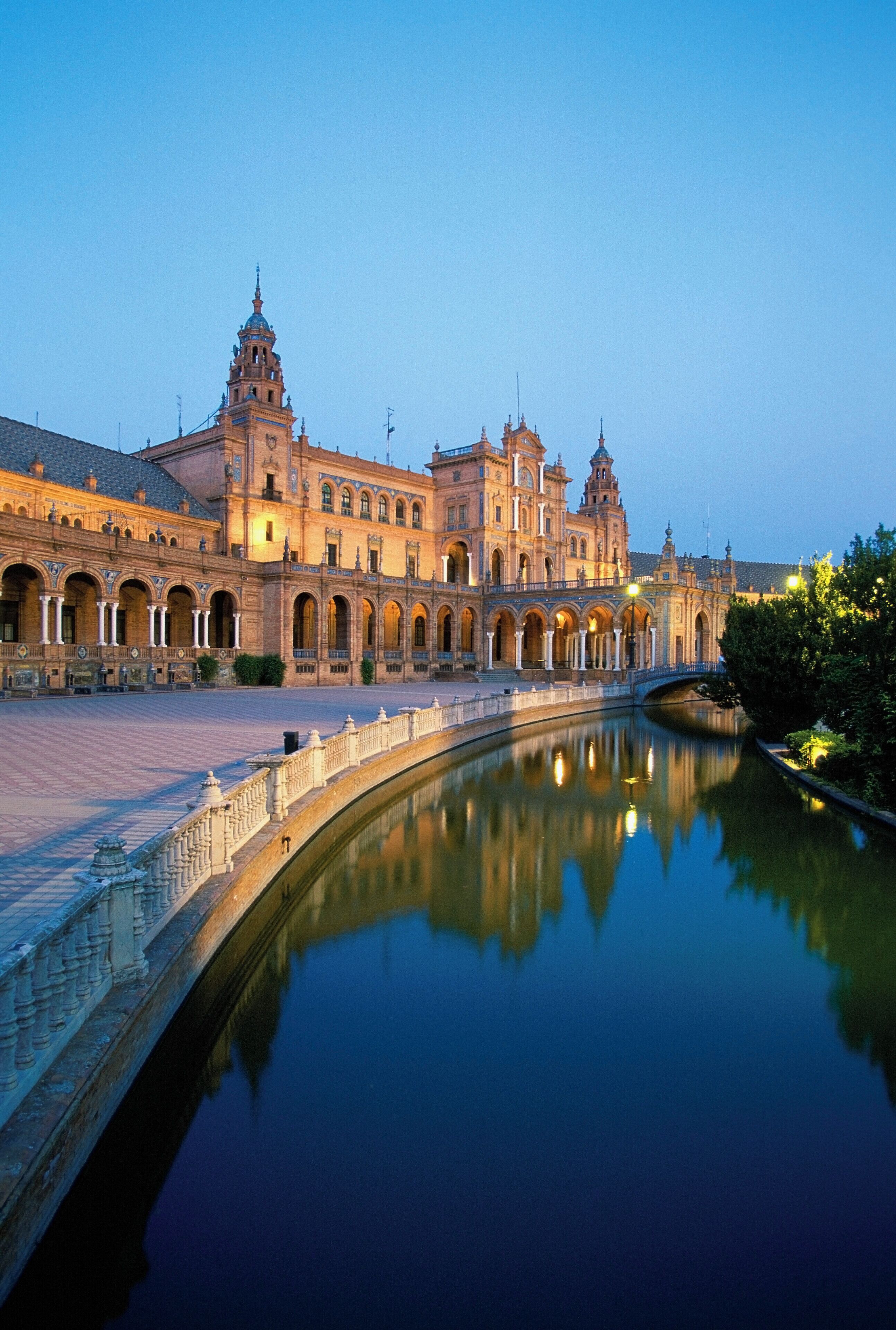 River along a building, Plaza de Espana, Seville, Spain