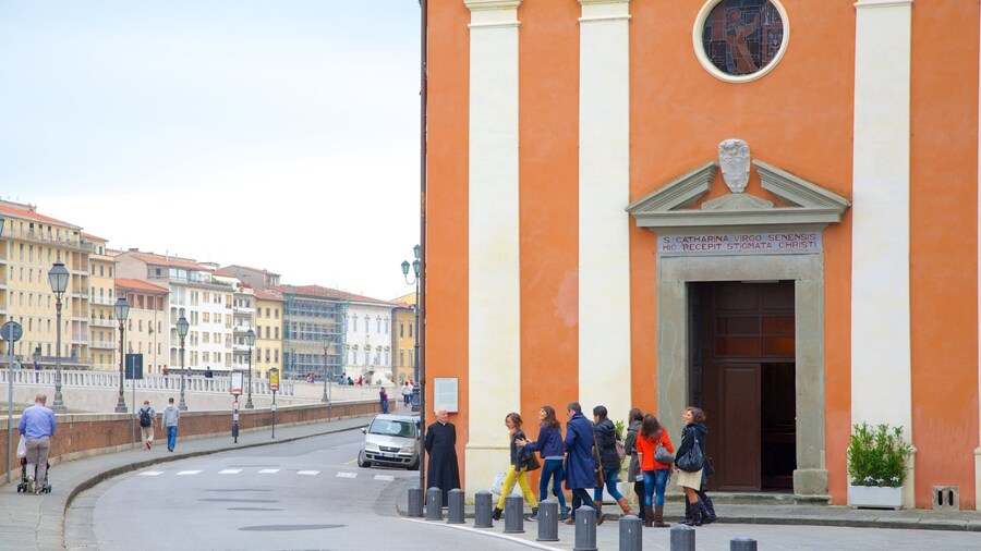 Palazzo Blu montrant scènes de rue et ville aussi bien que important groupe de personnes