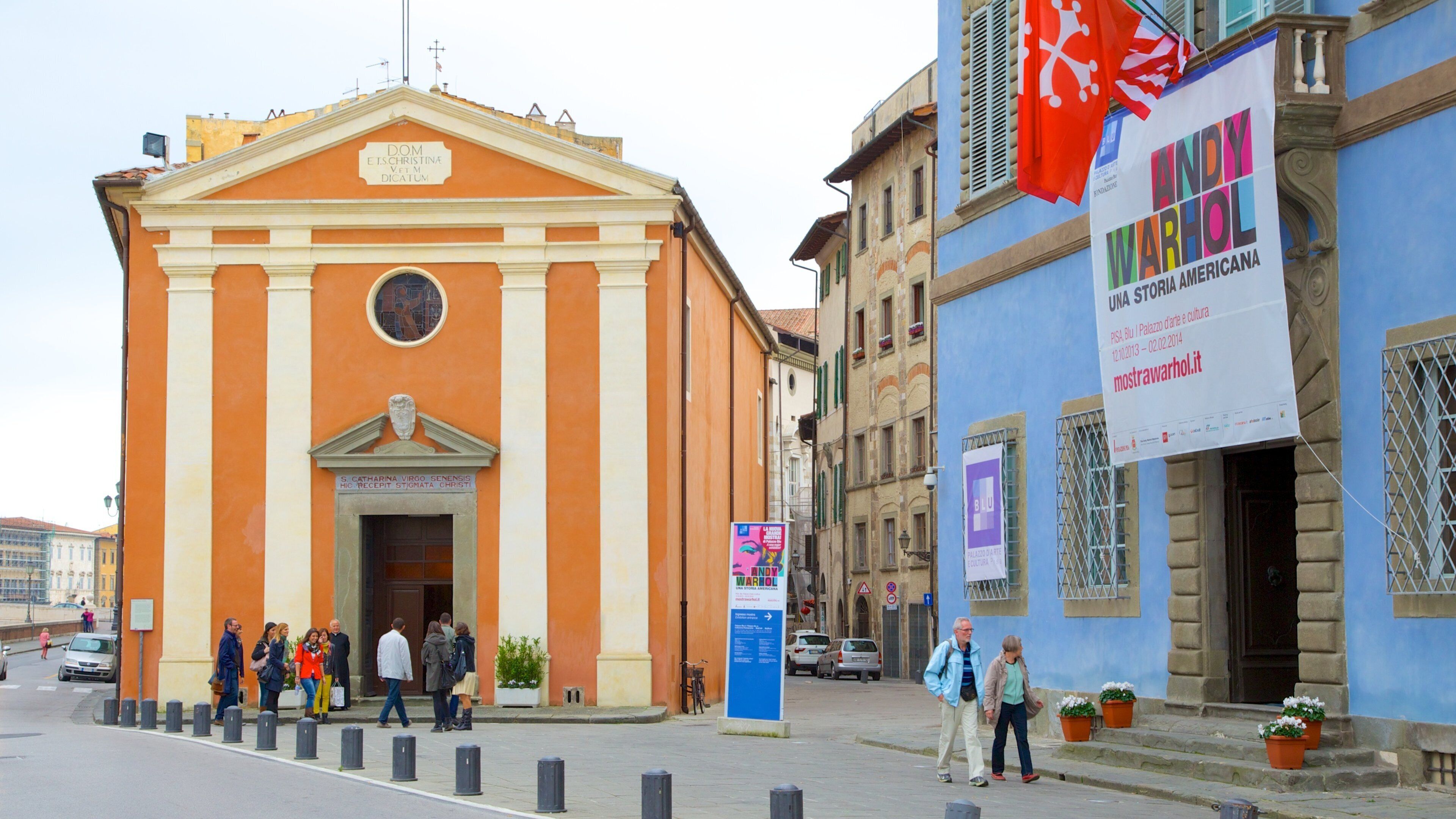 Palazzo Blu which includes street scenes, signage and a city