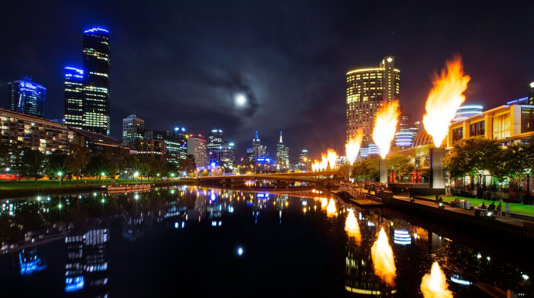 Moonrise over Melbourne city with the Corwn Casino fireballs are at display