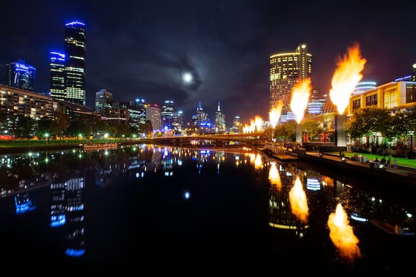 Moonrise over Melbourne city with the Corwn Casino fireballs are at display