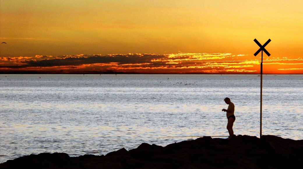 St. Kilda Beach showing general coastal views, a sunset and landscape views