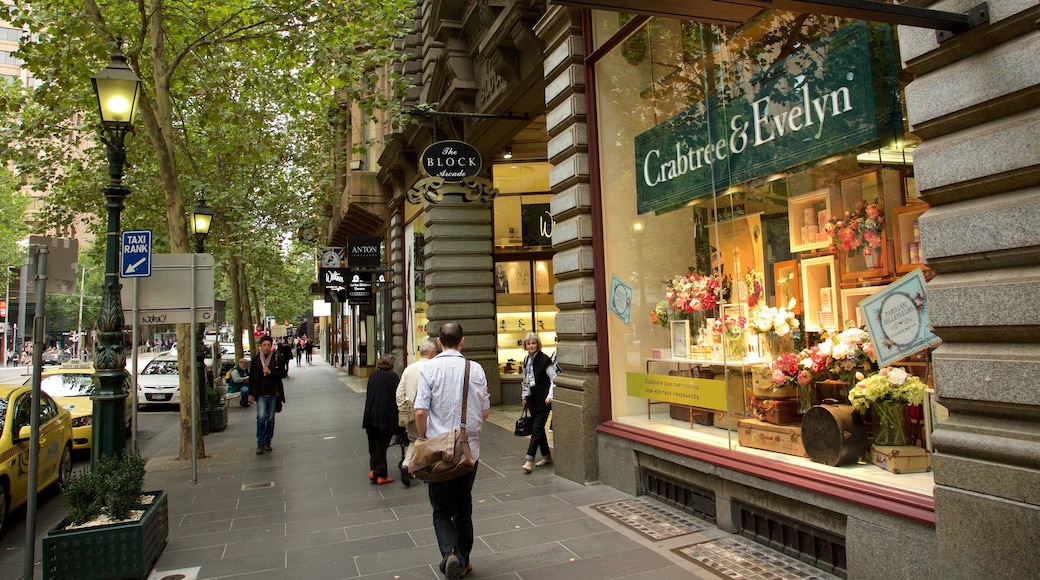 Block Arcade showing shopping as well as a small group of people