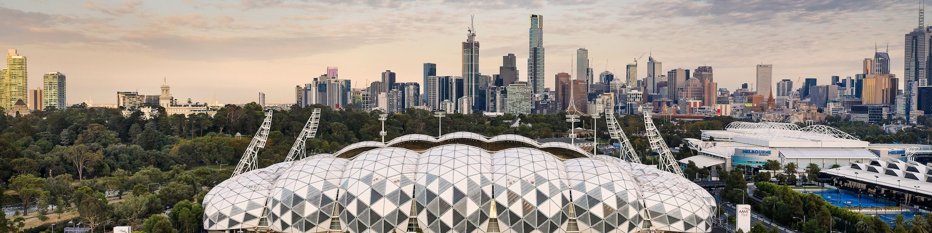 Melbourne Australia May 15th 2020 : Aerial panoramic dawn view of AAMI stadium, with the Melbourne city in the background