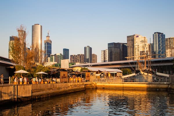 Southbank Promenade featuring a bay or harbor, a sunset and a city