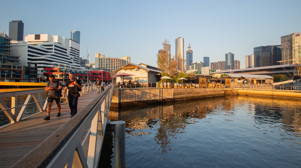 Southbank Promenade featuring a bay or harbor, a city and a sunset