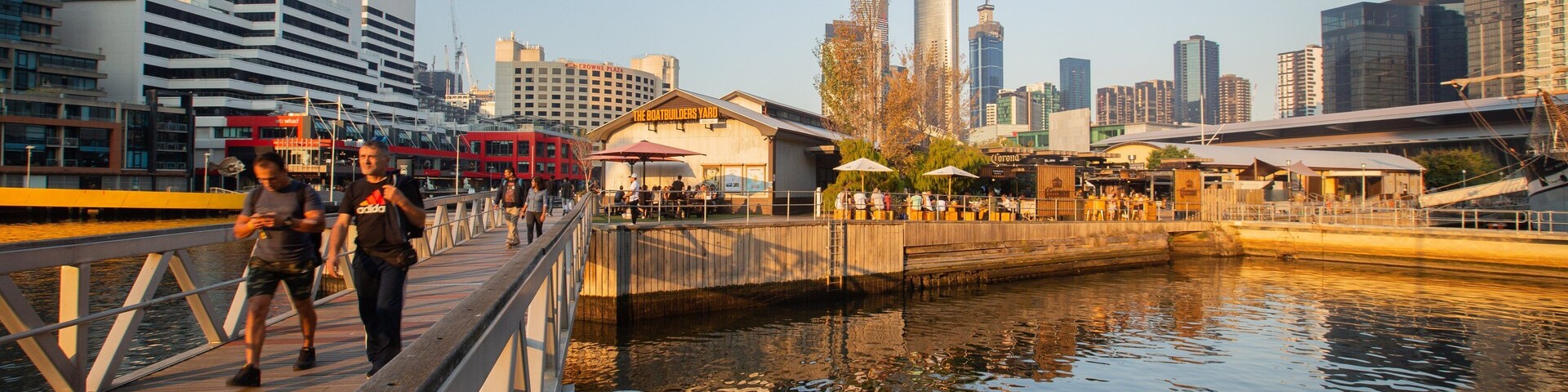 Southbank Promenade featuring a bay or harbor, a city and a sunset