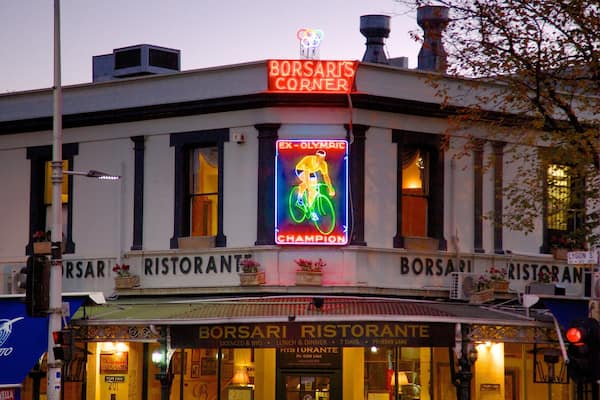 Lygon Street which includes signage, dining out and street scenes