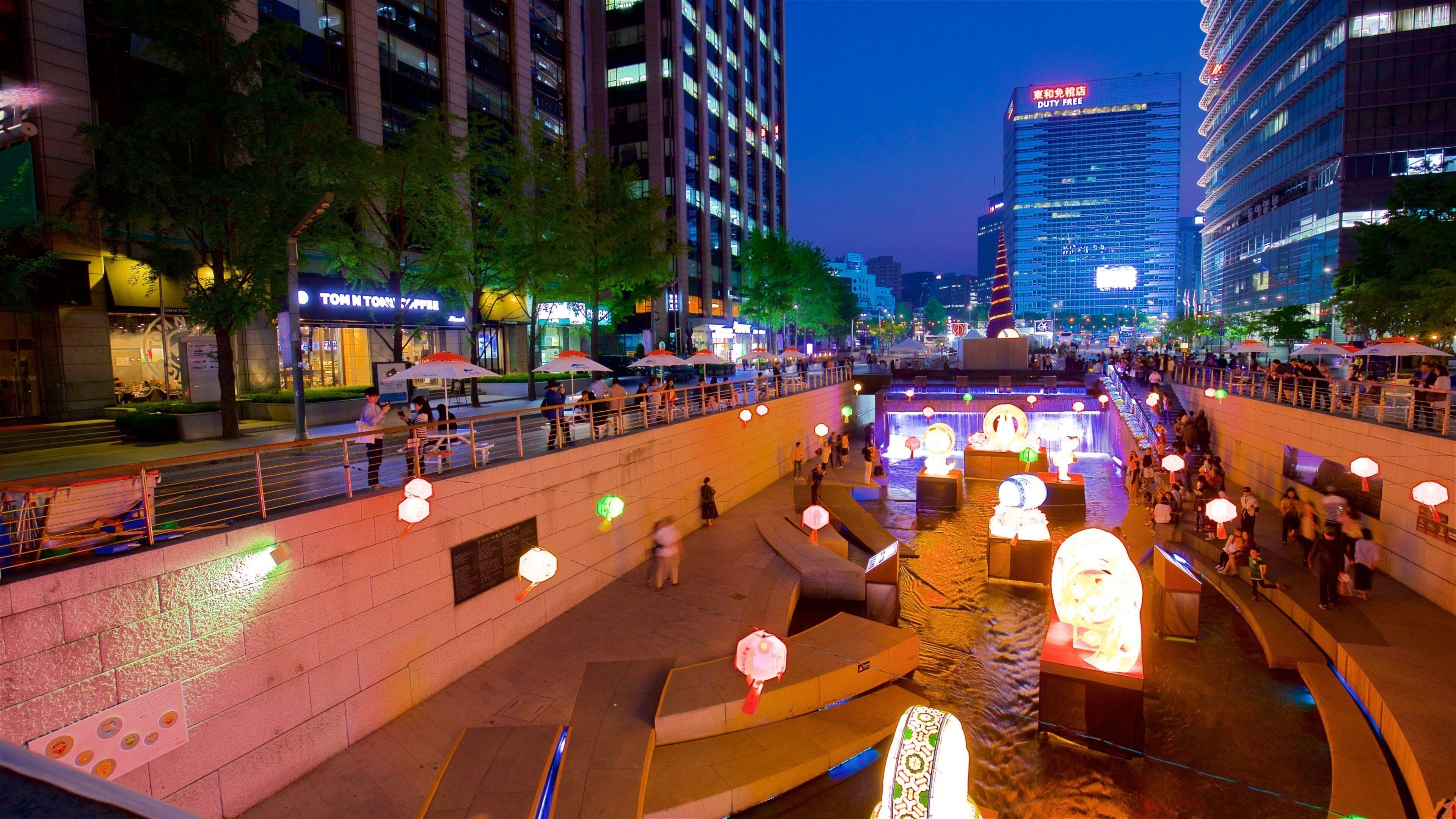 Cheonggyecheon which includes a river or creek, a city and night scenes